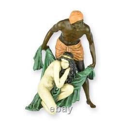 A Bronze Sculpture of a Man Shielding a Woman by Artist Franz Bergman