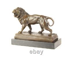 Art Deco Bronze Lion Sculpture on a Black Marble Base Signed