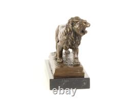Art Deco Bronze Lion Sculpture on a Black Marble Base Signed