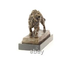 Art Deco Bronze Lion Sculpture on a Black Marble Base Signed