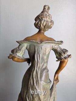 Beautiful sculpture of a woman in Art Nouveau style