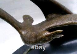 Bronze sculpture signed Elise Guy Art Deco Seagull in Full Flight in front of a Sail