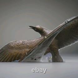 Bronze sculpture signed Elise Guy Art Deco Seagull in Full Flight in front of a Sail