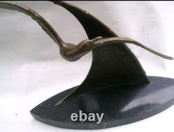 Bronze sculpture signed Elise Guy Art Deco Seagull in Full Flight in front of a Sail