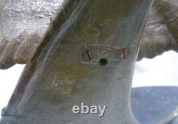 Bronze sculpture signed Elise Guy Art Deco Seagull in Full Flight in front of a Sail