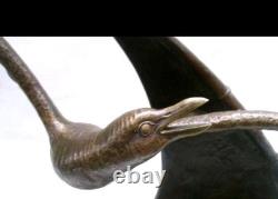 Bronze sculpture signed Elise Guy Art Deco Seagull in Full Flight in front of a Sail