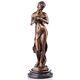 Sculpture Girl With Dove In Bronze Art Nouveau Style On A Black Marble