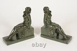 Sculptures of Carefree Bookends signed Janle Fonte from the Art Foundry Max le Verrier