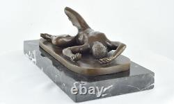 Solid bronze sculpture of a sexy athlete in Art Deco and Art Nouveau style.