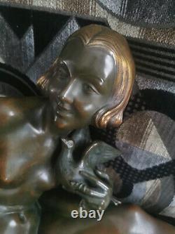 Superb Art Deco bronze by Armand Godard 1920-1930 lady with a dove