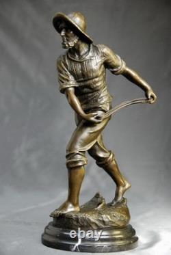 Art Nouveau- Pêcheur au filet signé d' Antoine Bofill sculpture en bronze