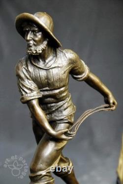 Art Nouveau- Pêcheur au filet signé d' Antoine Bofill sculpture en bronze