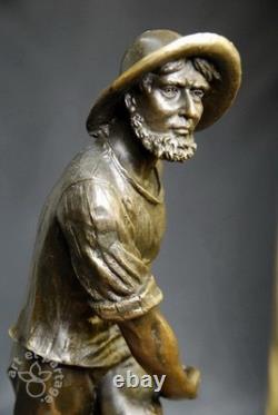 Art Nouveau- Pêcheur au filet signé d' Antoine Bofill sculpture en bronze