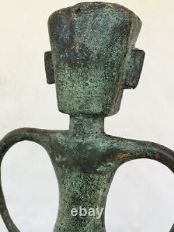 Sculpture Art Brut en bronze patiné personnage yeux exorbités