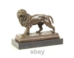 Sculpture Lion en bronze Art déco sur un socle en marbre noir Signée