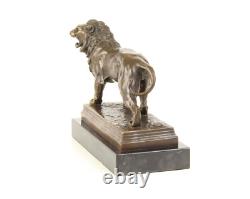 Sculpture Lion en bronze Art déco sur un socle en marbre noir Signée