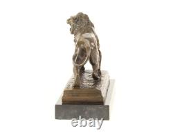 Sculpture Lion en bronze Art déco sur un socle en marbre noir Signée