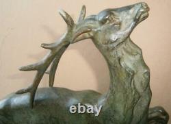 Sculpture animalière Art déco 1930 Cerf en régule patine vert bronze antique