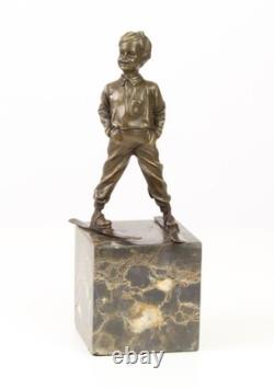Sculpture en bronze Art déco un garçon avec des skis d'après Ferdinand Preiss