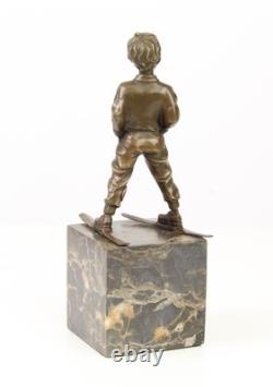 Sculpture en bronze Art déco un garçon avec des skis d'après Ferdinand Preiss