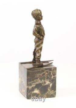 Sculpture en bronze Art déco un garçon avec des skis d'après Ferdinand Preiss