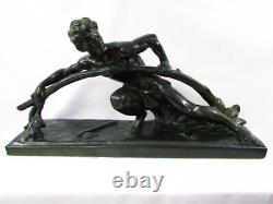 Sculpture en plâtre, patine bronze vert, signé BON, art déco