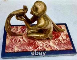 Sculpture statue Art-Déco 1920 1930 en bronze femme au faisan socle en marbre