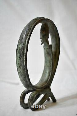 Statuette sculpture homme serpent bronze art africain Dogon Mali